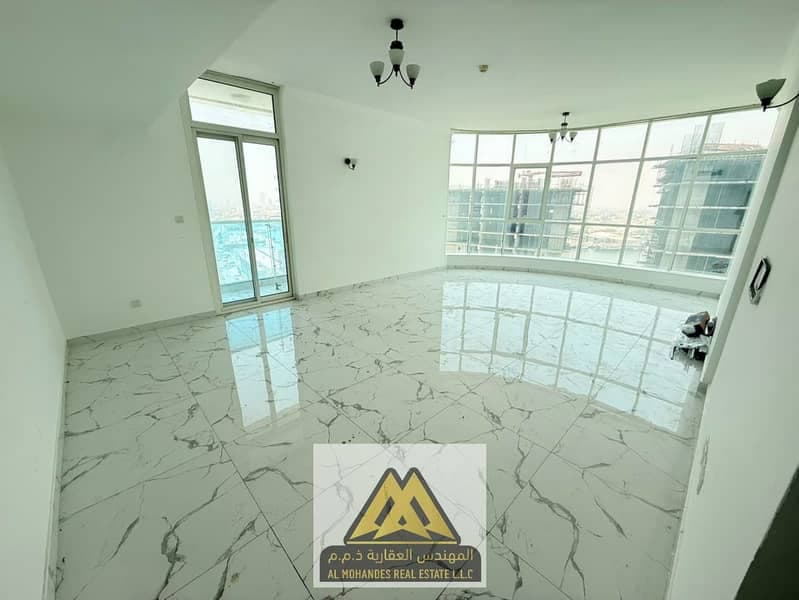 Luxury two-bedroom apartment with a living room | Al Waha Towers | Stunning views | Central air conditioning | Parking